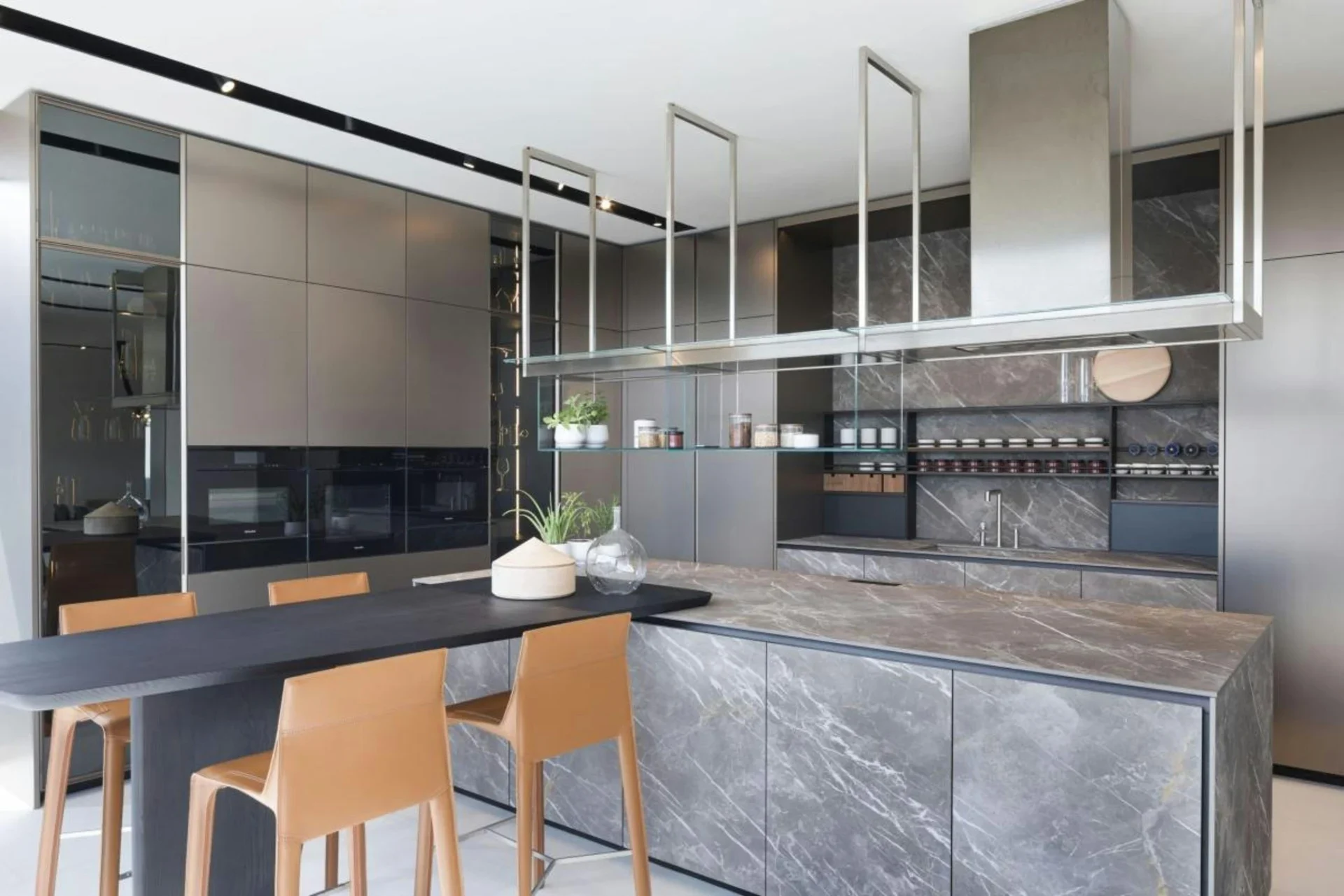 Contemporary gray kitchen with marble waterfall island