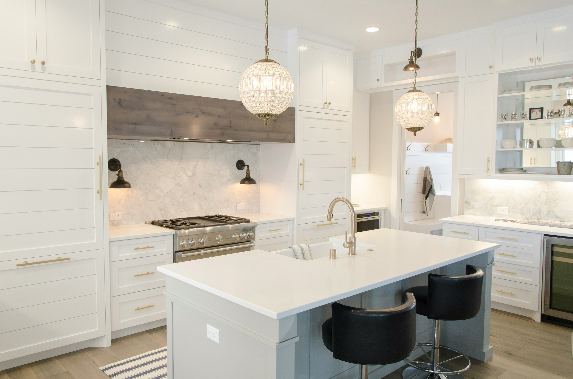Classic white shaker kitchen with crystal pendants